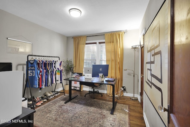 office featuring wood finished floors and baseboards