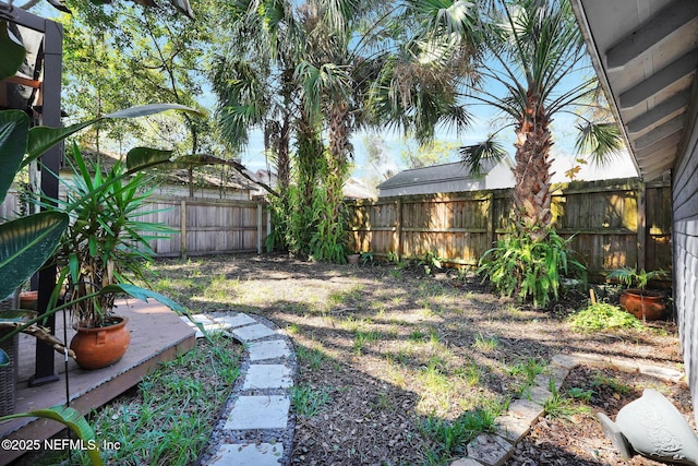 view of yard featuring a fenced backyard