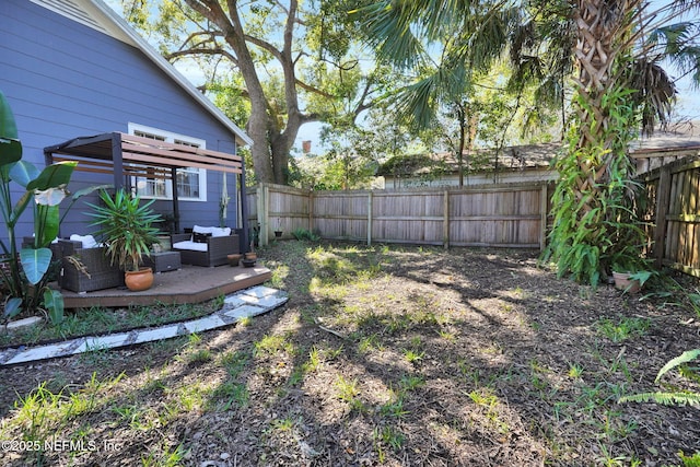 view of yard featuring an outdoor hangout area and a fenced backyard