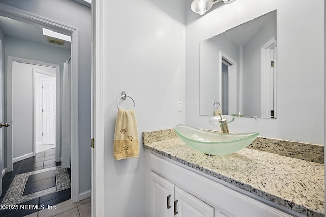 full bath with vanity, visible vents, and tile patterned floors