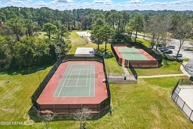 aerial view featuring a wooded view