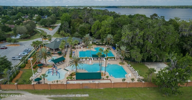 birds eye view of property featuring a water view