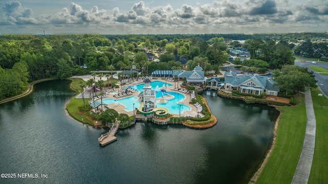 birds eye view of property with a water view