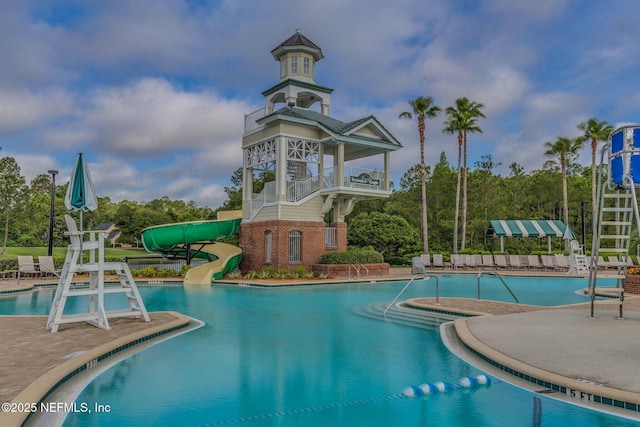 view of pool featuring a water slide