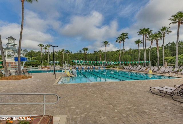 community pool featuring a patio area