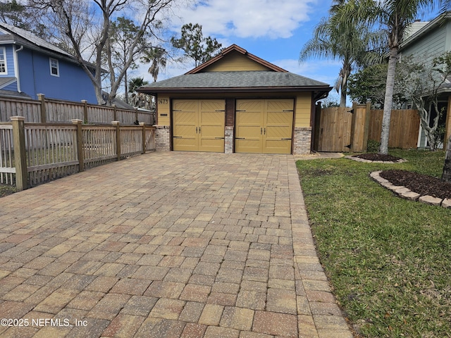 garage featuring fence