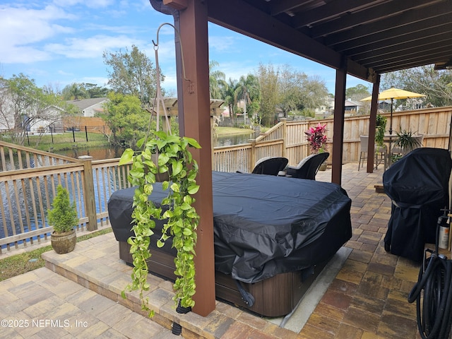 view of patio / terrace with outdoor dining area, a fenced backyard, and grilling area