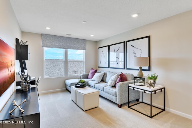 living area featuring recessed lighting, light colored carpet, and baseboards