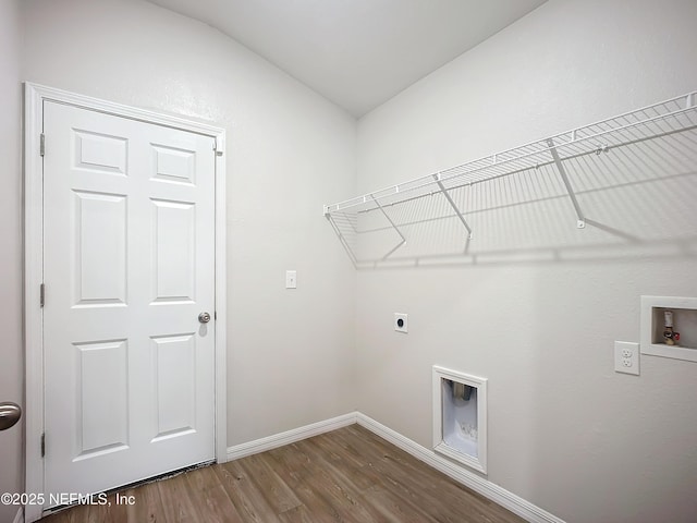 laundry area featuring hookup for a washing machine, electric dryer hookup, wood finished floors, laundry area, and baseboards