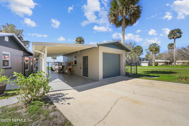 garage featuring driveway