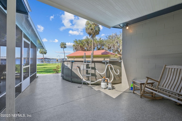 view of patio / terrace with a water view