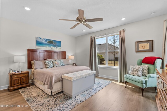 93322 Sandown Dr, Fernandina Beach, FL 32034 - bedroom featuring light wood-style flooring, baseboards, recessed lighting, and ceiling fan