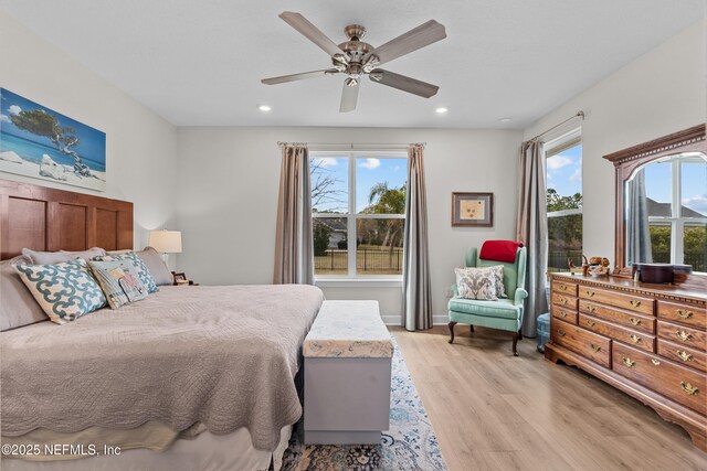 93322 Sandown Dr, Fernandina Beach, FL 32034 - bedroom with light wood-type flooring, recessed lighting, and a ceiling fan