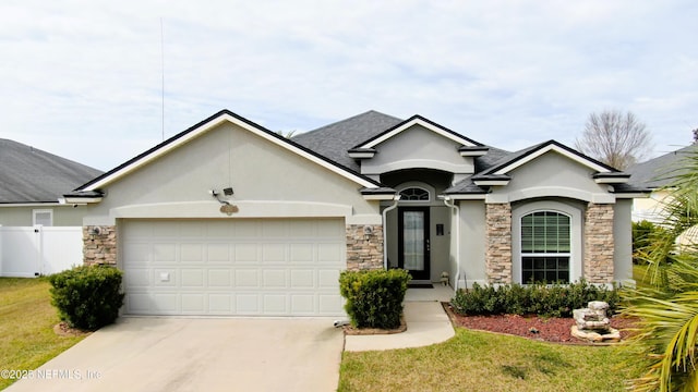 single story home featuring a garage, concrete driveway, stone siding, and stucco siding