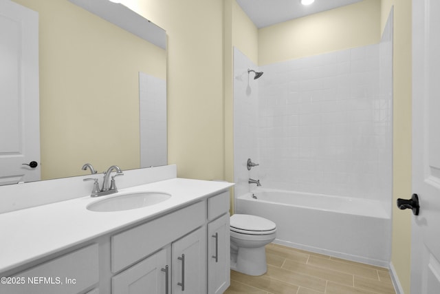 full bathroom with toilet, shower / washtub combination, and vanity