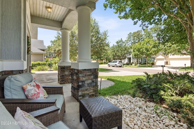 view of patio featuring a porch and a residential view