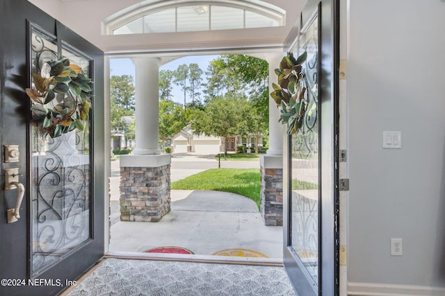 entryway with ornate columns