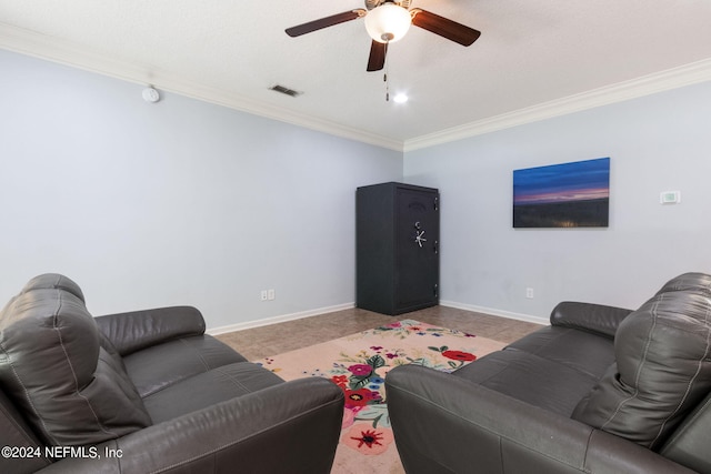 tiled living room with visible vents, crown molding, baseboards, and ceiling fan