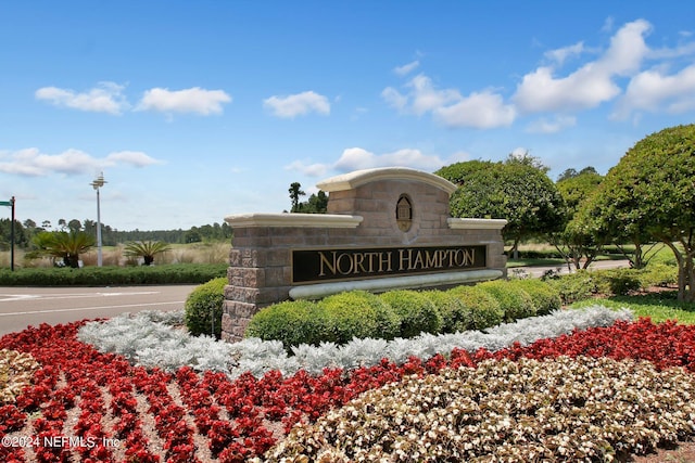 view of community sign