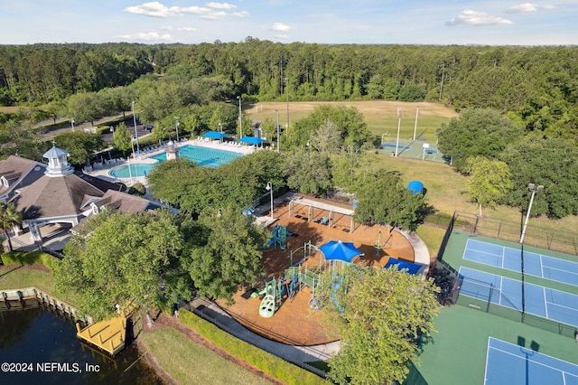 drone / aerial view with a view of trees