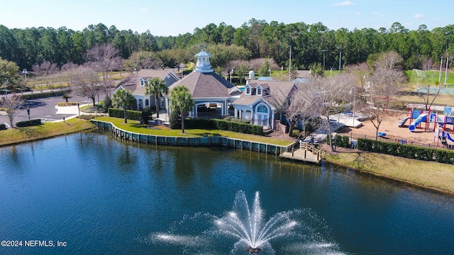 birds eye view of property featuring a water view