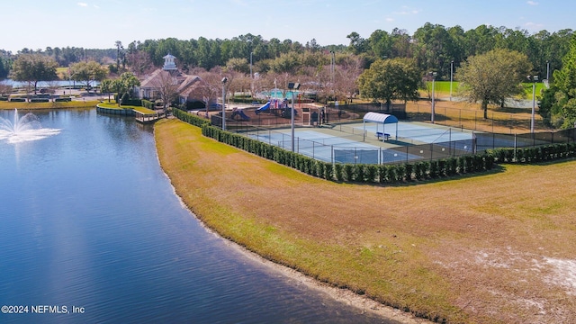 birds eye view of property featuring a water view