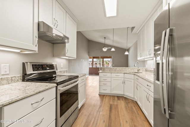 kitchen featuring a peninsula, under cabinet range hood, white cabinetry, and stainless steel appliances