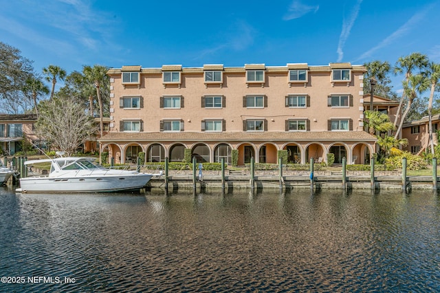 dock area featuring a water view