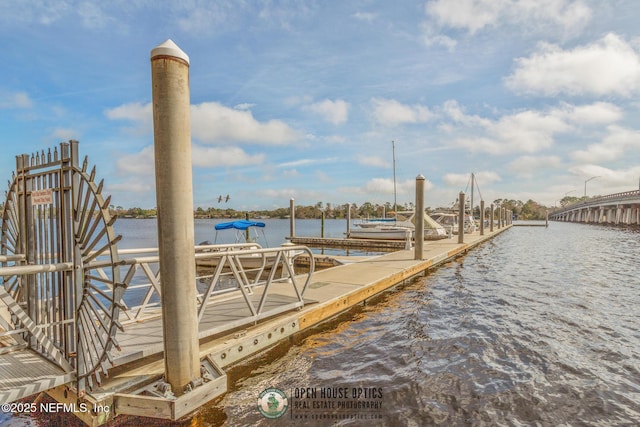 view of dock with a water view