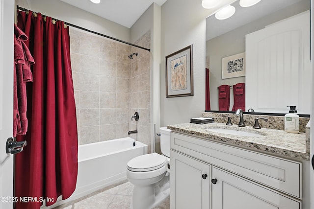 bathroom featuring toilet, tile patterned flooring, shower / bath combo with shower curtain, and vanity