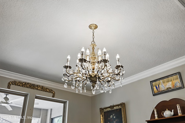 details featuring ornamental molding and ceiling fan with notable chandelier