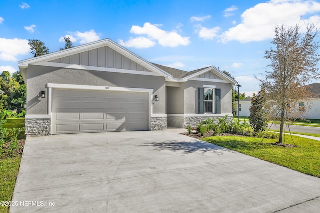 view of front of home with a garage, concrete driveway, stone siding, board and batten siding, and stucco siding