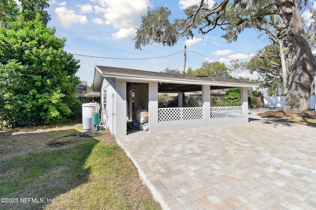 garage with fence