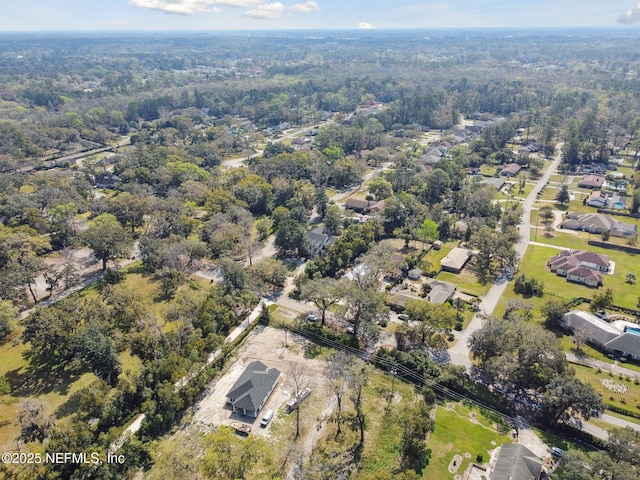 aerial view featuring a forest view