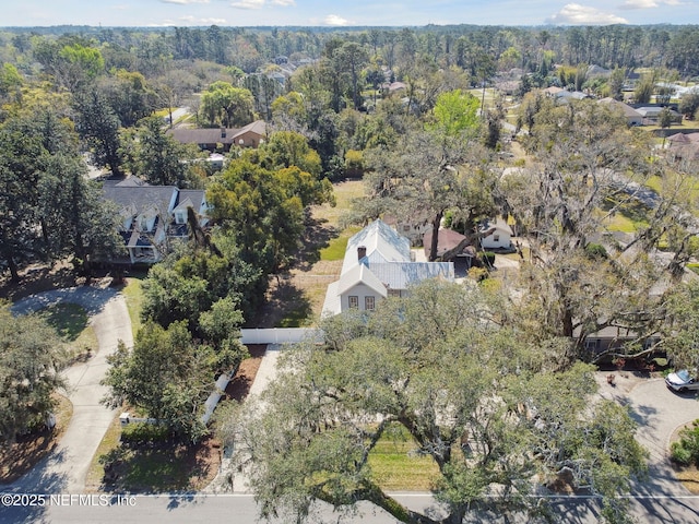 drone / aerial view with a view of trees