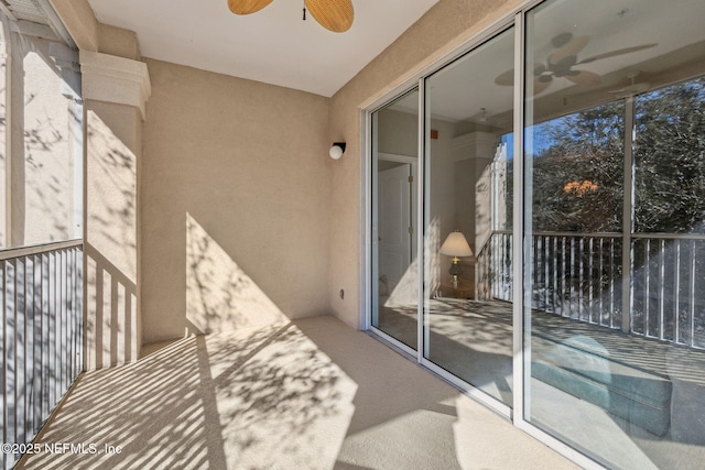 balcony featuring a ceiling fan