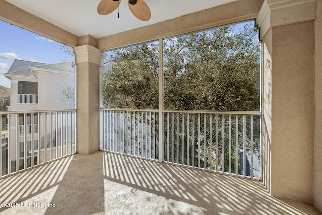 balcony featuring ceiling fan