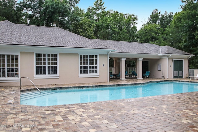 pool with a patio area