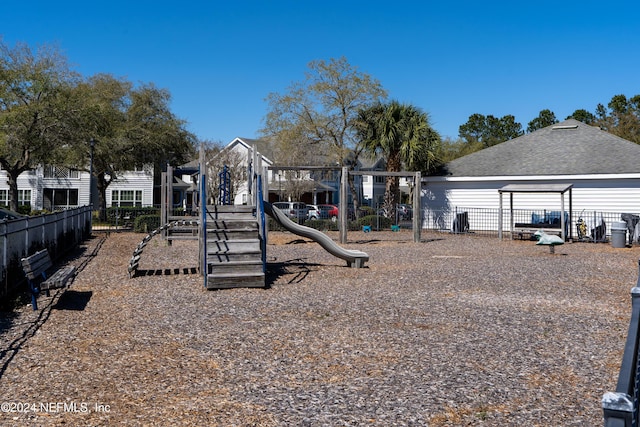 community play area featuring fence