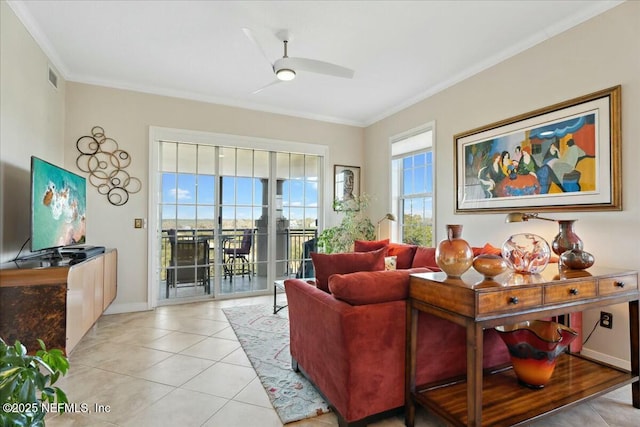 living room featuring visible vents, a ceiling fan, ornamental molding, and light tile patterned flooring