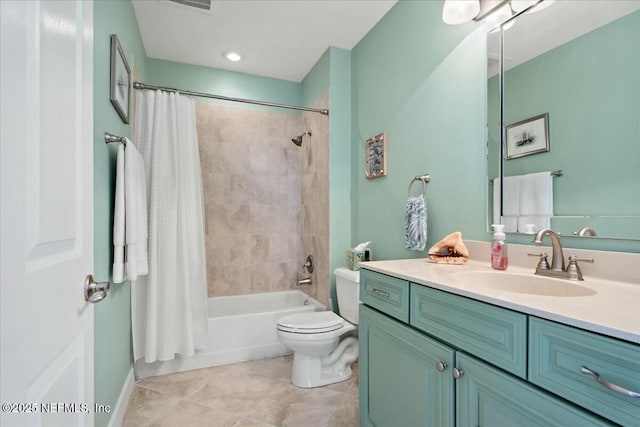 bathroom with toilet, shower / tub combo with curtain, vanity, and tile patterned flooring