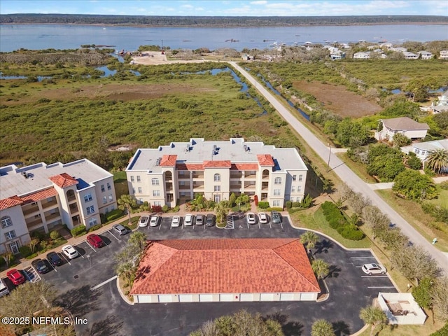 bird's eye view with a water view