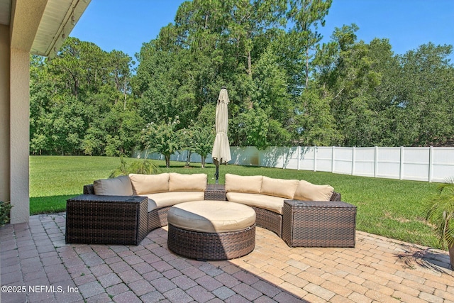 view of patio / terrace featuring a fenced backyard and outdoor lounge area