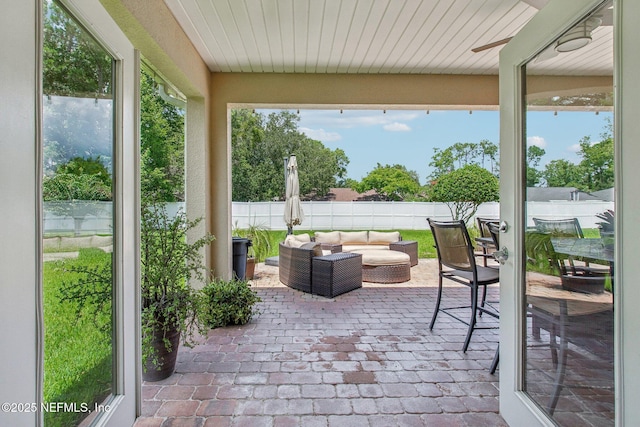 view of patio / terrace with outdoor lounge area and a fenced backyard