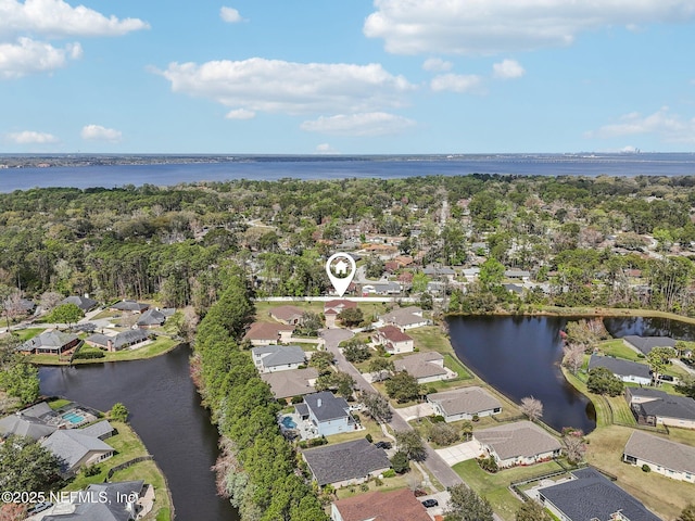 bird's eye view featuring a residential view and a water view