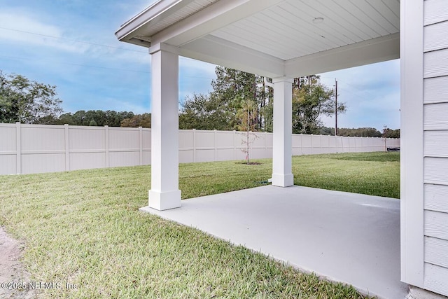 view of yard with a patio area and fence