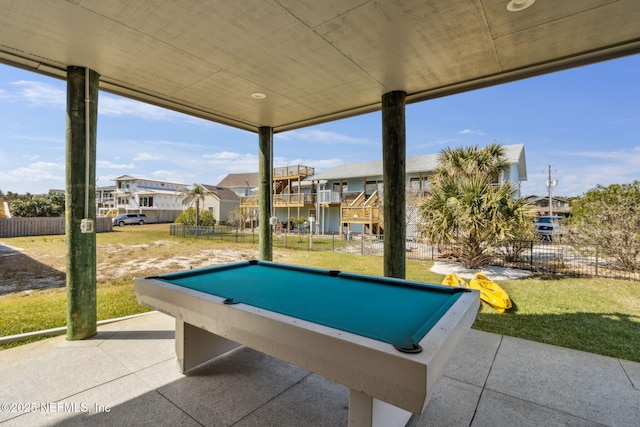 game room featuring a wall of windows, a residential view, and pool table