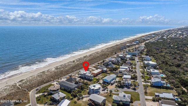 bird's eye view featuring a water view, a residential view, and a view of the beach