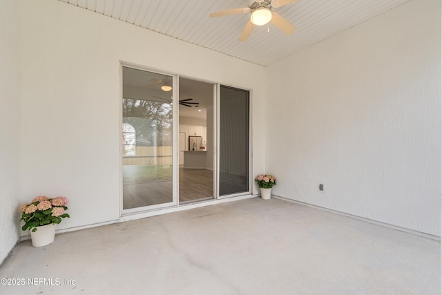 view of patio / terrace featuring ceiling fan