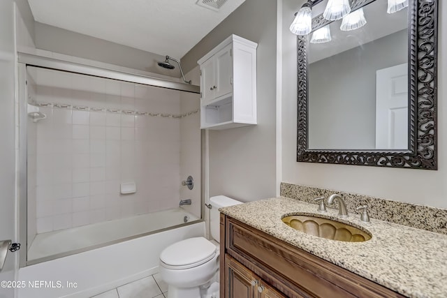 full bathroom featuring shower / washtub combination, visible vents, toilet, vanity, and tile patterned floors